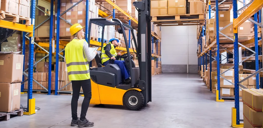 Warehouse staff using forklifts to manage cargo, representing efficient shipping and logistics services.